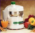 Centrifugal juicer surrounded by fruit.